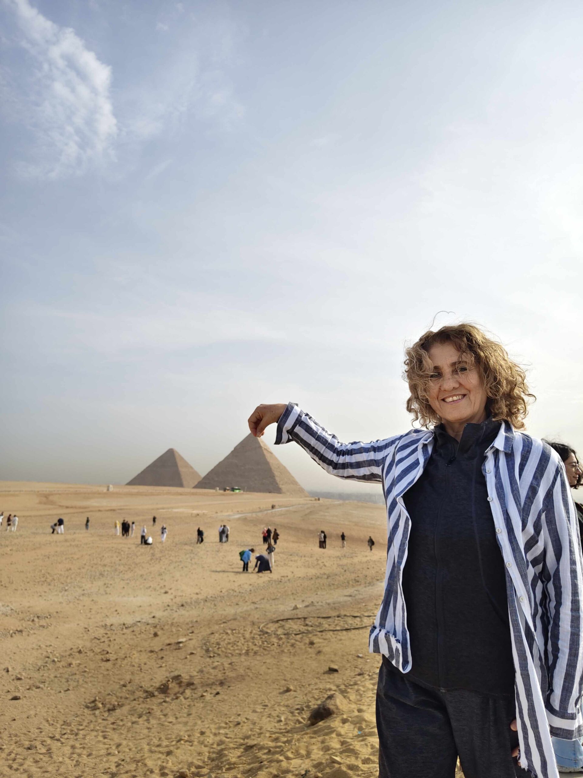 Tourist visiting the Giza Pyramids in Egypt for the first time